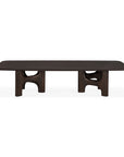 Ethnicraft Flow Coffee Table | Mahogany Rose Brown with a solid wood, wide rectangular top and two sculptural, arch-shaped legs.