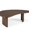 The Ethnicraft Boomerang Coffee Table features an organic, curved top and two fluted legs. Made from FSC-certified varnished teak in a rich dark brown finish, it boasts a minimalist modern silhouette.