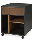 The Ethnicraft Oscar Drawer Unit - Teak - Black is a modern rolling cabinet featuring one ribbed solid teak drawer, open shelves, four caster wheels, and a minimalist black and natural wood finish.