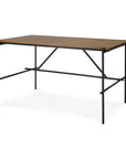 The Oscar Desk - Teak by Ethnicraft features a brown teak tabletop and black metal legs in a minimalistic, open-frame design—ideal workspace furniture for any modern office.
