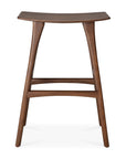 The Osso Barstool - Teak by Ethnicraft features a curved, FSC-certified teak seat, four angled legs with support bars, and a smooth, minimalist design that complements any space.