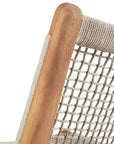 Close-up of the Ethnicraft Jack Woven Outdoor Lounge Chair backrest, highlighting its wooden frame and grid-pattern Italian weave rope, expertly wrapped to showcase detailed craftsmanship and natural materials.