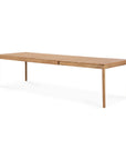 The Ethnicraft Bok Outdoor Extendable Dining Table in natural teak features a long rectangular design with a slatted top and four straight legs, displayed against a white background.