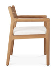 Side view of the Ethnicraft Jack Outdoor Dining Chair - Teak (with armrest), made from solid teak with angled legs, a flat backrest, and a white outdoor fabric cushion. It blends minimalist style with classic European elegance.
