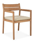 The Jack Outdoor Dining Chair - Teak by Ethnicraft features a light teak frame, horizontal slat backrest, armrests, and a beige cushioned seat, delivering classic European refinement in modern outdoor seating.