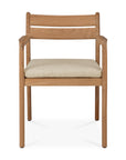 The Jack Outdoor Dining Chair - Teak by Ethnicraft features solid teak construction, a light beige outdoor fabric cushion, straight legs, a horizontal slat backrest, and smoothly finished wooden armrests for classic European elegance.