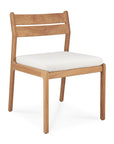 The Ethnicraft Jack Outdoor Dining Chair - Teak (without armrest) features a solid teak frame, horizontal slatted backrest, cushioned white seat, and minimalist design with clean lines and angled legs for modern style.