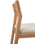 A close-up side view of the Ethnicraft Jack Outdoor Dining Chair - Teak (without armrest) shows its modern design, clean lines, and light-colored outdoor fabric seat cushion against a white background.