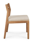 The Jack Outdoor Dining Chair - Teak by Ethnicraft features a light beige cushioned seat in outdoor fabric, modern wooden frame without armrests, clean lines, and a rectangular cutout in the backrest.