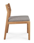 Side view of the Ethnicraft Jack Outdoor Dining Chair - Teak (without armrest), showing a solid teak frame, slightly inclined backrest, and cushioned gray outdoor seat, set against a plain white background.