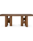 Ethnicraft Flow Dining Table | Teak Wild Brown made of solid wood with rounded corners and two sculptural, H-shaped pedestal legs.