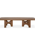 Ethnicraft Flow Coffee Table | Teak Wild Brown made of solid wood, featuring a rectangular top with rounded corners and four sculptural, arch-shaped legs.