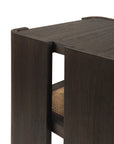 Close-up of the Ethnicraft Panel Side Table, showcasing its modern design with clean lines, open side section, and a visible woven shelf within a rich dark wood finish.