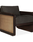 The Panel Lounge Chair - Dark Brown Teak by Ethnicraft features a plush cushion and elegant rattan detailing.