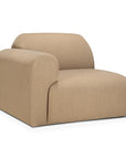 The Bulky Modular Sofa by Ethnicraft features a minimalist, boxy design with a low backrest, rounded edges, and luxurious light sepia upholstery for a modern look.