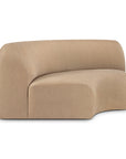 The Bulky Modular Sofa - Light Sepia by Ethnicraft is a modern, minimalist piece with a curved back and seat, smooth rounded edges, high-density memory foam cushions, and a legless, armless design.