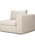 The Ethnicraft Mellow Modular Sofa in off white features a modern design with a left armrest, low backrest, and clean, boxy lines, reflecting European craftsmanship and set against a plain white background.