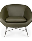 Ethnicraft Barrow Lounge Chair - Green Leather featuring curved arms and a metal cross-frame base.