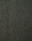 Close-up of a dark, textured fabric surface with a subtle grid-like woven pattern, reminiscent of the high-performance stain-resistant Eco Fabric featured on the Ethnicraft N701 Modular Sofa - Moss. The material appears soft and slightly variegated in color, lending it a natural, organic appearance.