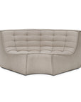 The Ethnicraft N701 Modular Sofa in Ecru eco fabric features a modern, tufted design with a curved back, ideal for corner arrangements and contemporary interiors.