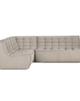 The Ethnicraft N701 Sectional Sofa in Ecru (High Performance Fabric) features a modern L-shaped design, tufted square cushions, low arms, and customizable configuration. Its stain-resistant fabric offers a minimalist, contemporary look.