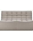 The Ethnicraft N701 Sectional Sofa in ecru high performance fabric, featuring a modern armless design and tufted grid-style upholstery, is shown against a white background.