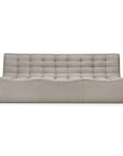 The N701 Modular Sofa - Ecru (Eco Fabric) by Ethnicraft is a modern, stain-resistant sofa with a low tufted back and seat, shown from the front on a white background.
