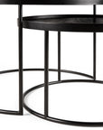 The Ethnicraft Tray Coffee Table - Set of 2 features two round black metal tables of varying heights with thin frames and circular bases, partially nested for a modern look against a white background.