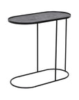 The Oblong Tray Side Table by Ethnicraft features a modern, minimalist design with a black metal oval top and three slender legs connected to an oval base, inspired by sleek coffee table style.