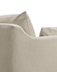 Close-up of the corner and backrest of the Weave sofa | 2 Seater Bone by Ethnicraft, showcasing its beige linen-blend upholstery with a textured surface. The image highlights the sofa’s clean lines and a slightly wrinkled cushion on its removable slipcover.