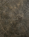 Close-up of the Blend Dining Table - Ray Whisky by Ethnicraft shows a textured metallic surface with circular, sunburst-like patterns in bronze, gold, and dark brown—perfect for interchangeable table tops in commercial spaces.