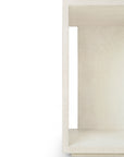 Minimalist image of the Ethnicraft Elements Bedside Table, white and textured, open rectangular design, shown on the right with the left side cropped against a clean white background.