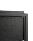 Close-up of the Monolit Nightstand - Black Oak by Ethnicraft, featuring a modern European oak tabletop with a square metal frame. The visible wood grain and corner detail showcase timeless minimalist design and classic European refinement.