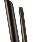 The Pi Coat Stand in mahogany by Ethnicraft features two dark brown cylindrical sticks, one rounded and one chiseled, elegantly displayed against a white background.