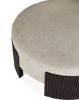 The Ethnicraft Roller Max Pouf is a large round ottoman featuring a beige upholstered cushion and dark wood slatted base, shown from above against a white background.