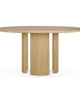 The Ethnicraft Roller Max Round Dining Table - Oak features a smooth, round top and four cylindrical legs with a modern, geometric look, shown against a white background.