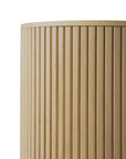 Close-up of the Ethnicraft Roller Max Side Table in solid oak, featuring vertical grooves and a light, natural finish that highlights its craftsmanship. The cylindrical table is photographed against a plain white background.