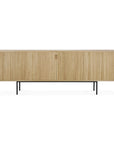 The Ethnicraft Roller Max Sideboard features a light wood finish, vertical slatted doors, discreet handle cutouts, and slim black metal legs for a modern, minimalist look.