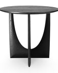 The Ethnicraft Geometric Side Table - Black Oak features a modern round top, unique intersecting curved base, and elegant minimalist design from the brand’s Geometric Collection.