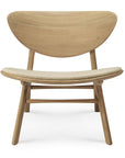 The Eye Lounge Chair - Oak with Off White Fabric by Ethnicraft features a solid oak seat, wide curved backrest, and cushioned off white fabric seat, shown from the front on a white background.