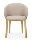 The Ethnicraft Unda Dining Chair, designed by Studio Segers, features a beige upholstered shell, curved backrest, and light wooden legs. It is shown from the front against a white background.