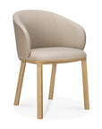 The Ethnicraft Unda Dining Chair features a light beige upholstered shell seat with a curved backrest, four wooden legs, and a minimalist Studio Segers-inspired design.