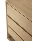 Close-up of the Ethnicraft Nordic Dresser, made from solid European oak with three drawers and a minimalist, modern design featuring clean lines.