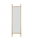 The Ethnicraft PI Floor Mirror - Oak is a full-length mirror with a light solid oak frame, upright on two vertical legs and a horizontal base support, featuring a polished imperfect finish.