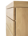 Close-up of the Burger Dresser by Ethnicraft, crafted from solid European oak with clean, modern lines and recessed horizontal handles for a touch of classic European refinement.
