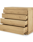 The Ethnicraft Burger Dresser features four wide drawers, each partially open, crafted from solid European oak. Its simple, modern design and light natural wood finish highlight classic European refinement.