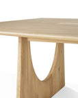 The Ethnicraft Geometric Meeting Table - Oak features a smooth square top and a unique leg with a semi-circular cutout, crafted from solid oak with a light, natural finish.