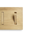 The Utilitile Wall Hanger by Ethnicraft features a minimal rectangular wooden panel with two solid oak coat pegs at varied angles, adding a modern, Ethnicraft-inspired accent to your space.