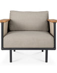 The Corbey Outdoor Lounge Chair by Ethnicraft features a modern metal frame, light beige upholstery, and wooden armrests—ideal for outdoor spaces. Shown front-facing on a white background.