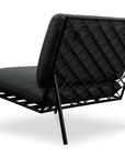 The Salma Outdoor Lounge Chair by Moes features a black metal frame, diamond-pattern lattice back, and dark quick-dry foam cushions on the seat and backrest, displayed at an angle on a white background.